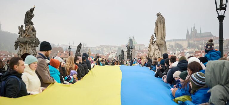 Ukrainians in Prague link human chain of unity on iconic Charles Bridge